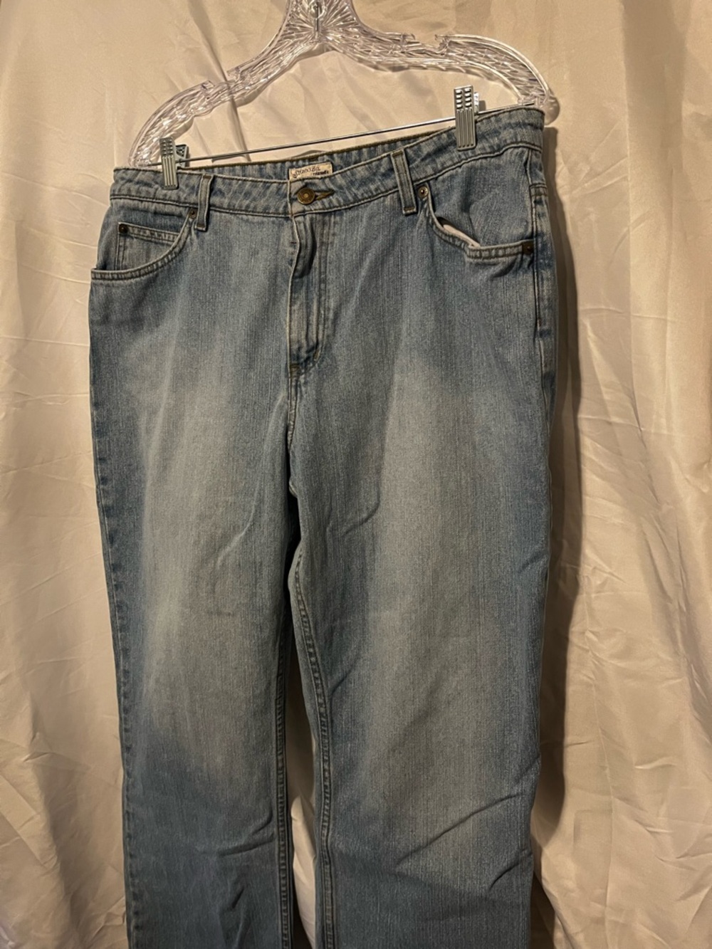 St. John's Bay Light Blue High-Rise Women's Jeans. Size 16s.

Imp crcl in red.